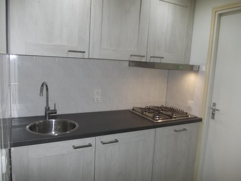 Apartment + Studios Insulinde Tilburg Rum bild